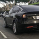 Illustration for article titled Tesla Model X Prototype Caught Wearing Darth Vader Camo